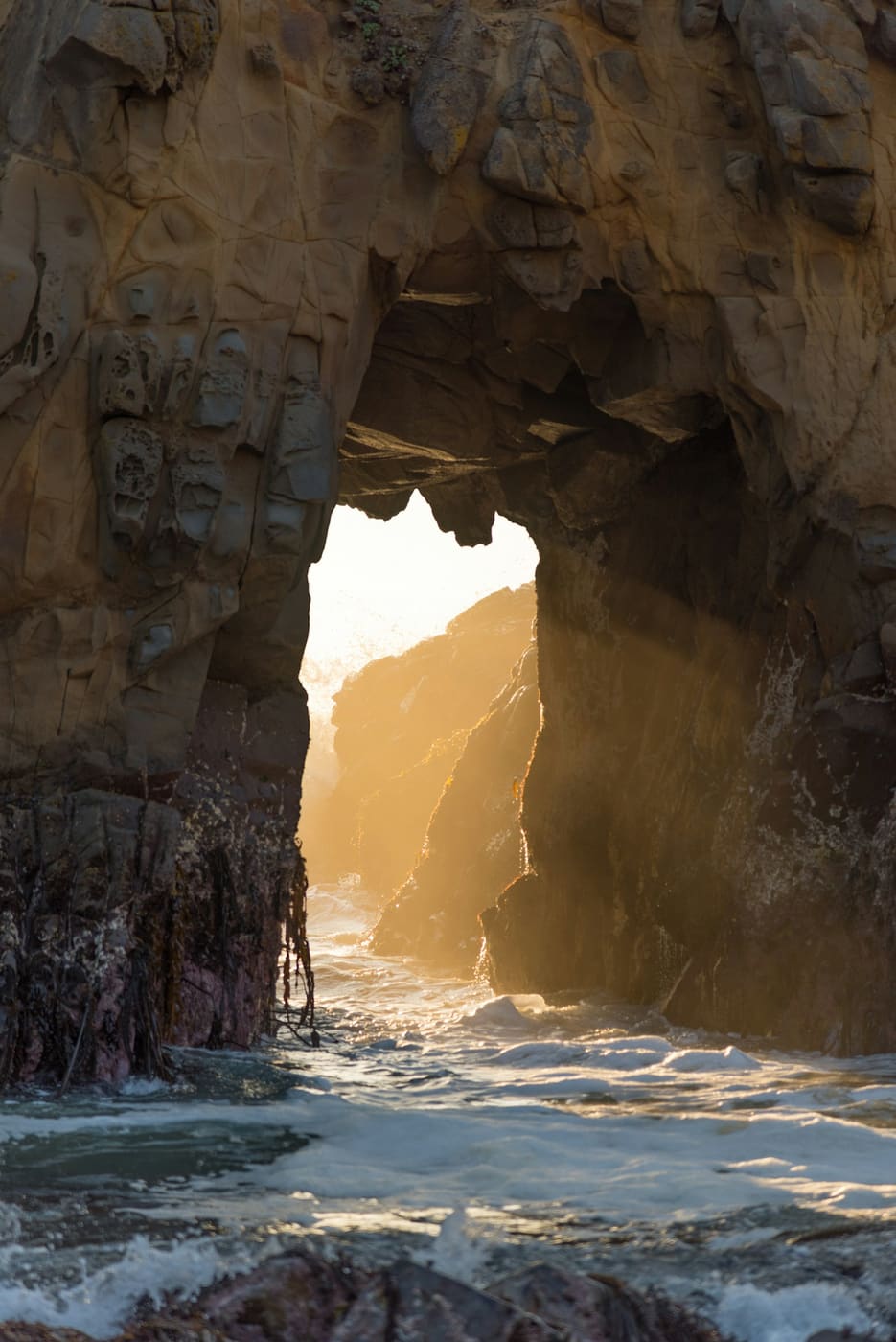 Sea arch at golden hour in Big Sur